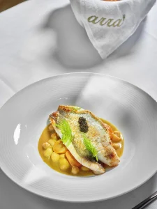 Branzino con curry di cocco