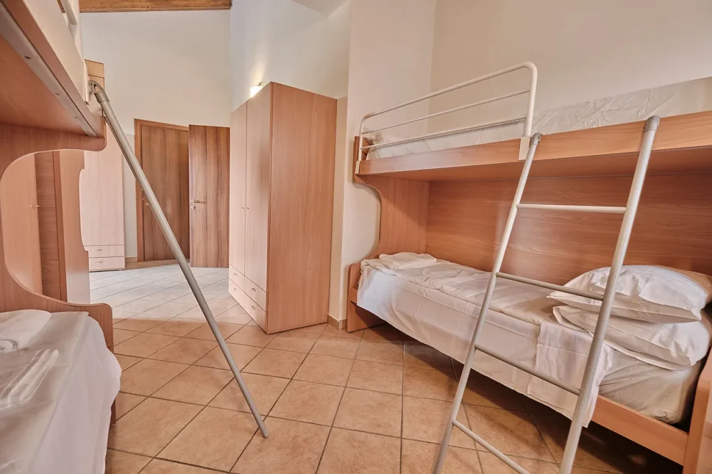Guest room inside the Piramide delle Erbe